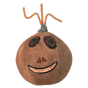 Brown canvas rustic pumpkin with button eyes and stitched smile perfect for halloween pumpkins and gourds decor