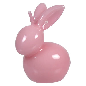 Pink ceramic or porcelain bunny figurine with a glossy finish.