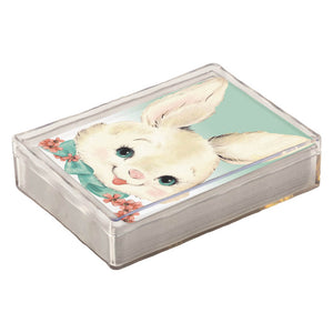 Clear plastic box with vintage-style bunny rabbit artwork on top.