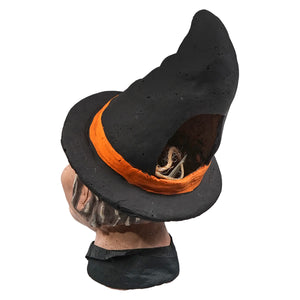 Black witch hat with bright orange band and twine inside as cackling witch lantern honest heirloom decor piece