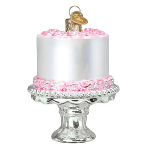 Silver and pink frosted birthday cake ornament with gold heart hanger on glass pedestal dessert and confectionary ornament