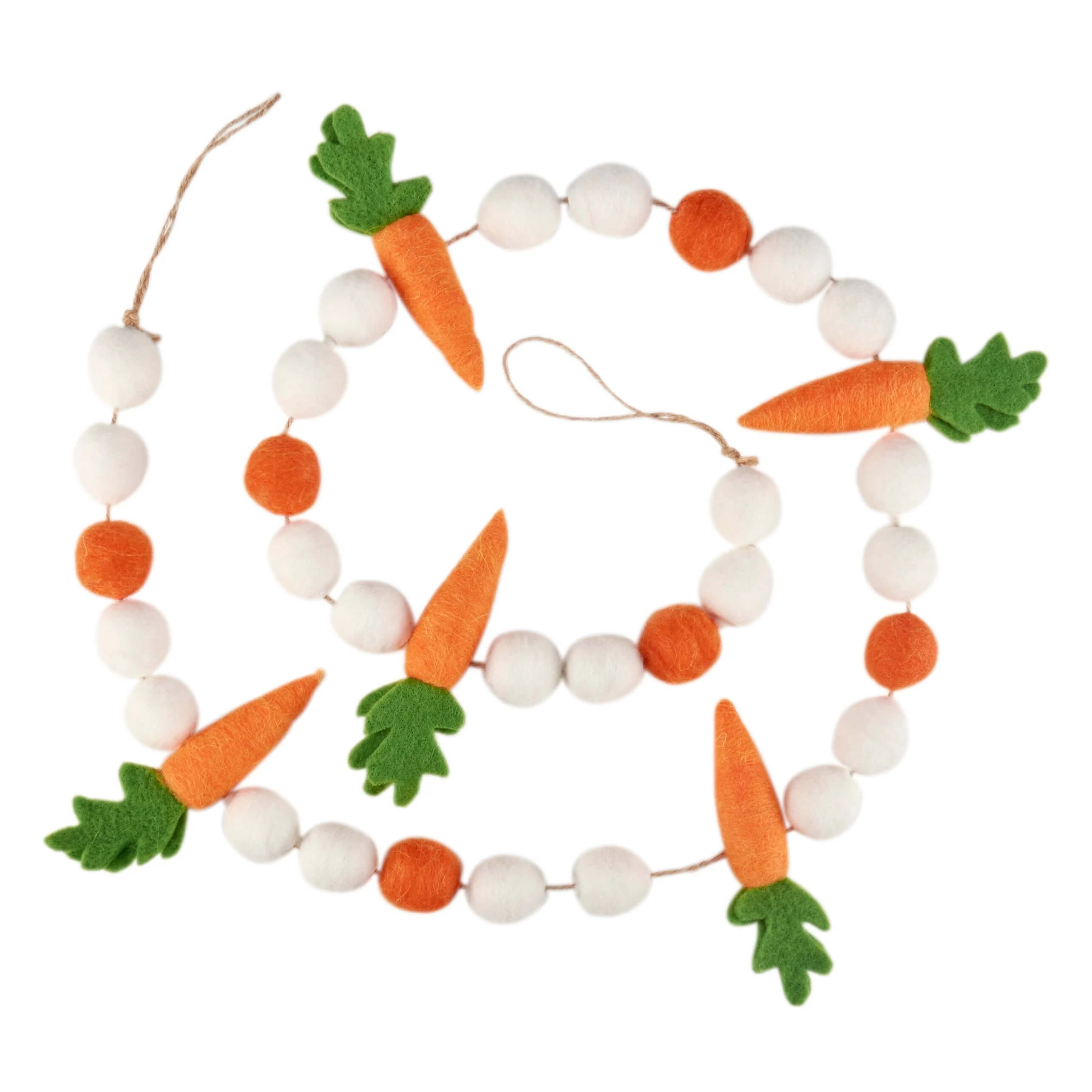 A carrots garland from kathy’s christmas collection featuring felt orange carrots with green tops and white pom-poms for easter & spring garlands