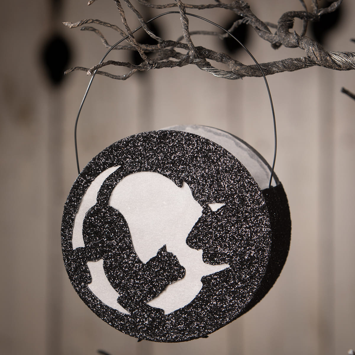 Black glittery bethany lowe cat in moon lantern with white cat and moon silhouette perfect for halloween cats decor