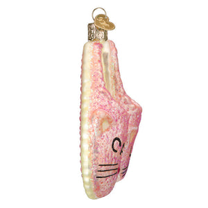 Pink glittery glass cat lady slippers ornament shaped like a ballet slipper with black whisker details and gold loop figural decor