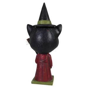 Black cat figurine wearing a pointed witch hat with green band and red robe from catrina whisker witch halloween cats collection