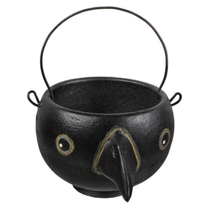 Black cast iron crow-shaped egg cup with painted eyes beak and wire handle bethany lowe halloween decor