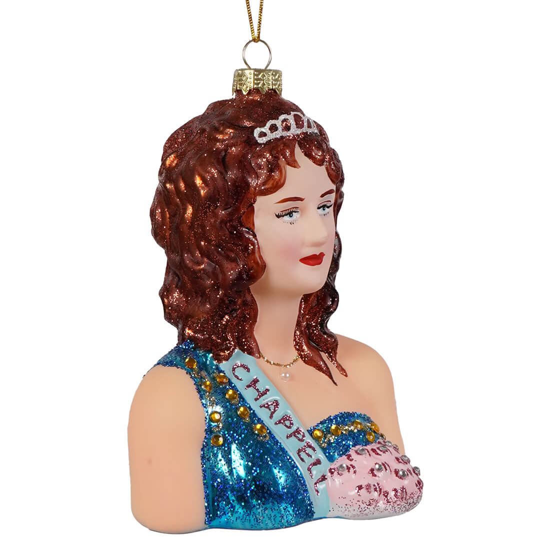 A glossy glass ornament featuring a bust of a woman with curly reddish-brown hair and a blue glittery chappell sash