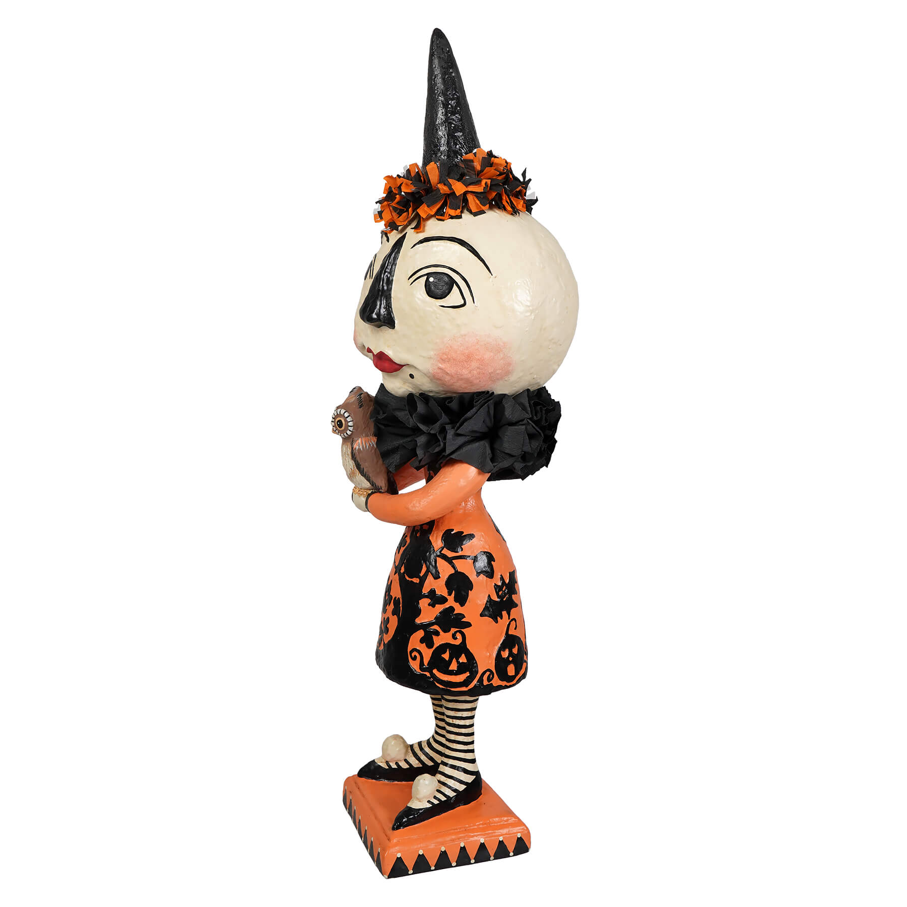 A whimsical miss moon witch figurine by bethany lowe halloween with orange black hat ruffled collar and pumpkin dress
