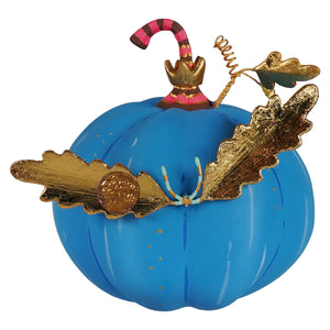 A cheery blue pixie halloween pumpkin ornament in vibrant blue with gold foil leaves and a candy cane hat
