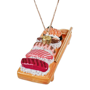 Chef’s kiss sushi platter ornament by cody foster design featuring colorful beaded fish and rice on a wooden base