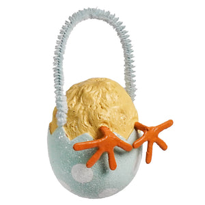 A bethany lowe chick tail ornament featuring a light blue speckled egg with orange chick feet and fuzzy white handle