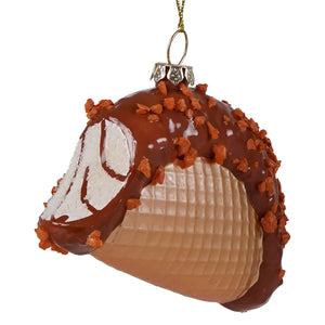 Choco taco glass ornament of a chocolate-dipped waffle cone with orange topping and silver hanging loop