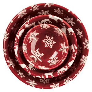 Set of three nested red ceramic christmas bowl set with white snowflake and reindeer patterns