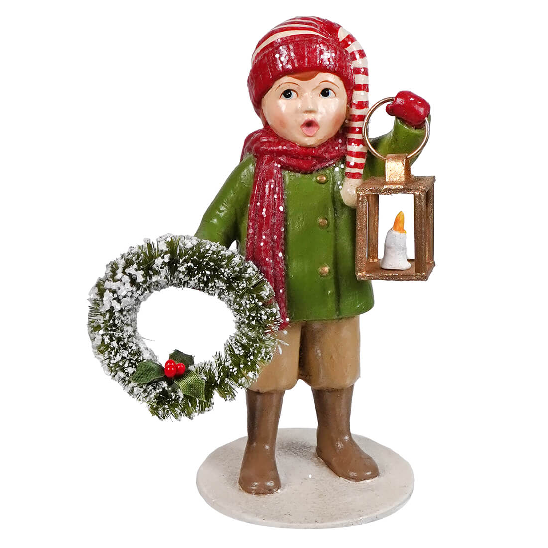 A christmas caroling figurine in a red and white hat holding a lantern and wreath perfect for christmas tabletop decor