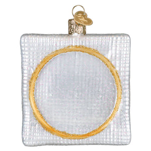 Silver glass christmas cross stitch ornament with textured surface and gold-rimmed cutout perfect figural decor
