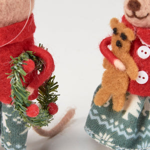 Felt christmas mouse figurine in red sweater with white buttons holding a brown teddy bear from merry mouse critter set