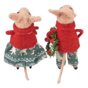 Two festive felt christmas mouse critters in red tops with green patterns one holding a miniature wreath