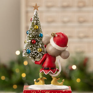 A charming bethany lowe christmas mouse gus figurine in gray with a red santa hat holding a decorated mini tree