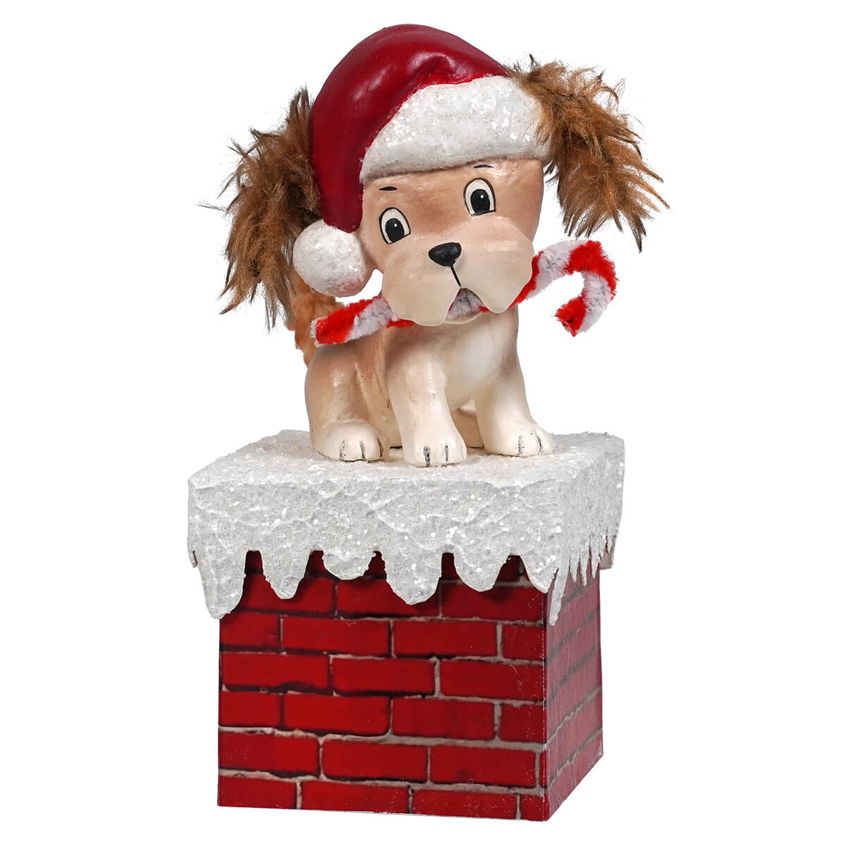 Plush puppy wearing a Santa hat and holding candy canes while sitting on a brick chimney.