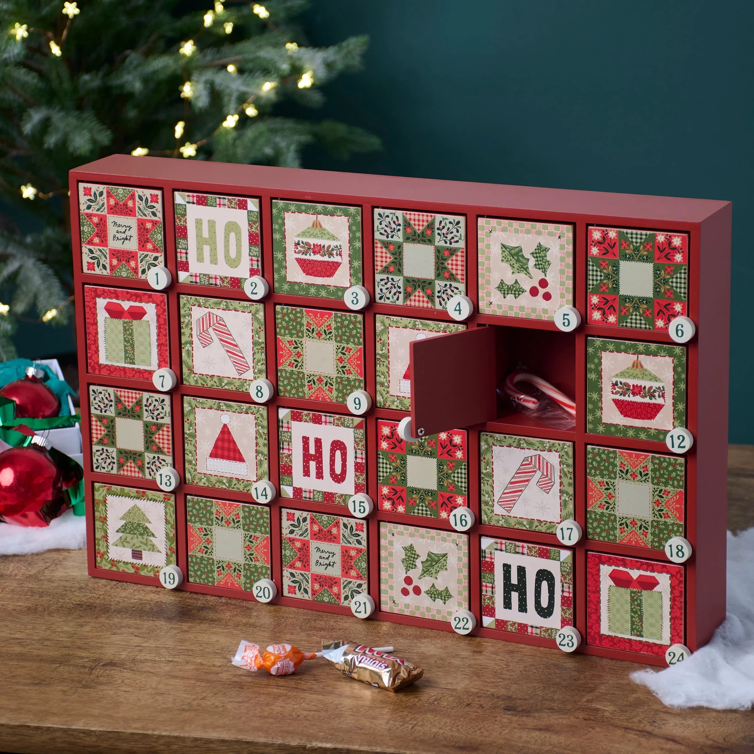 Red wooden christmas quilt countdown box with 24 numbered compartments featuring festive quilted patterns for merry christmas countdown and christmas decorations & ornaments