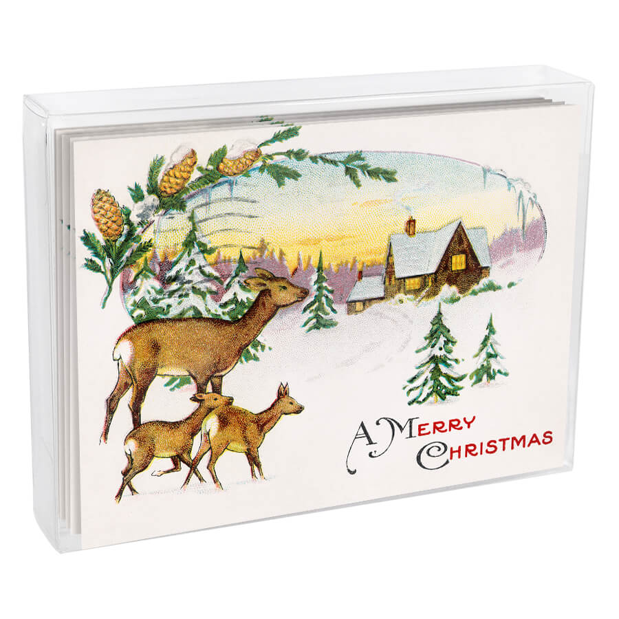 Vintage-style Christmas card box featuring a winter scene with deer and a cabin.