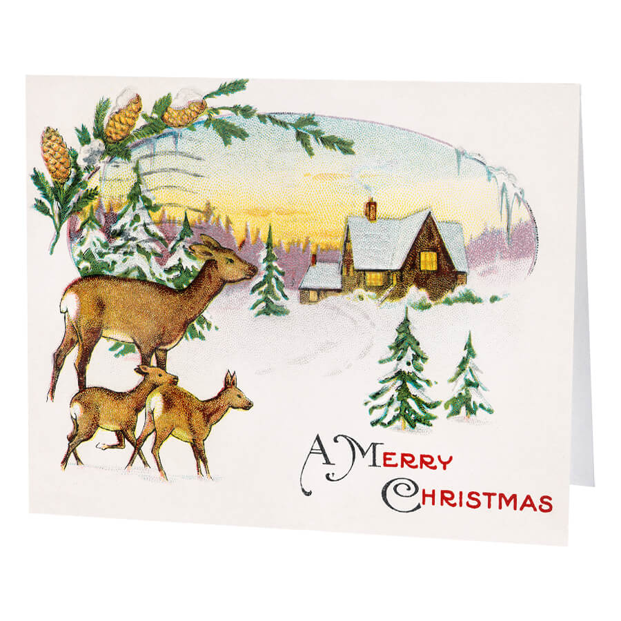 Vintage Christmas card featuring deer in a snowy landscape with a cabin.