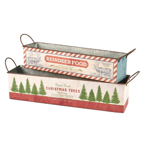 Two stacked metal planters with festive holiday designs labeled reindeer food and farm fresh christmas trees bin set