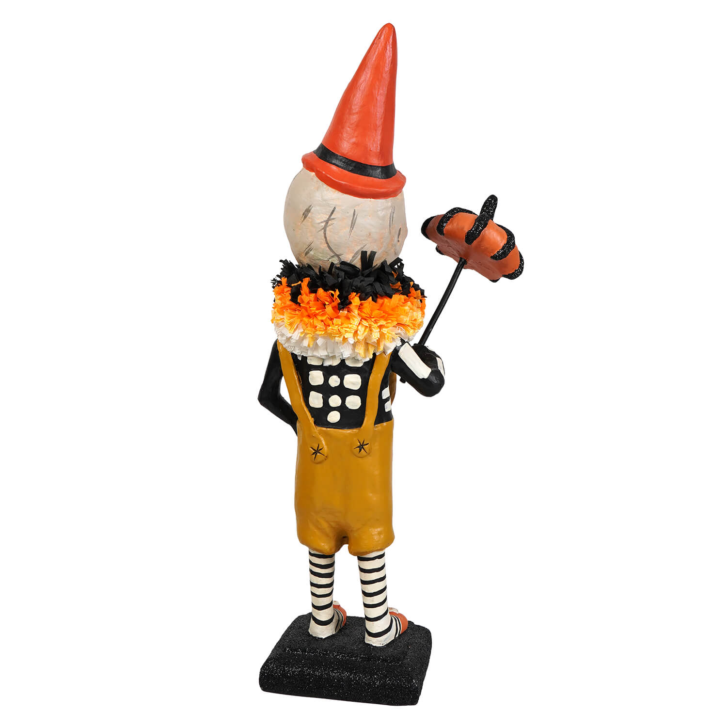 Circus skelly skeleton decor figure with white painted skull, yellow polka dot overalls, striped socks, and orange conical hat