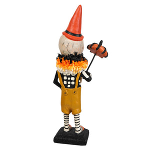 Circus skelly skeleton decor figure with white painted skull, yellow polka dot overalls, striped socks, and orange conical hat