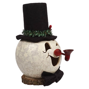 Clyde miniature snowman gourd by meadowbrooke gourds is a white figurine with a black top hat green garland and red berries