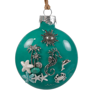 Teal glass coastal seahorse christmas ornament decorated with silver sea creatures starfish and palm trees