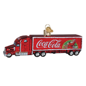 Red glass coca-cola christmas truck ornament with santa illustration, a festive transportation ornament perfect for holidays