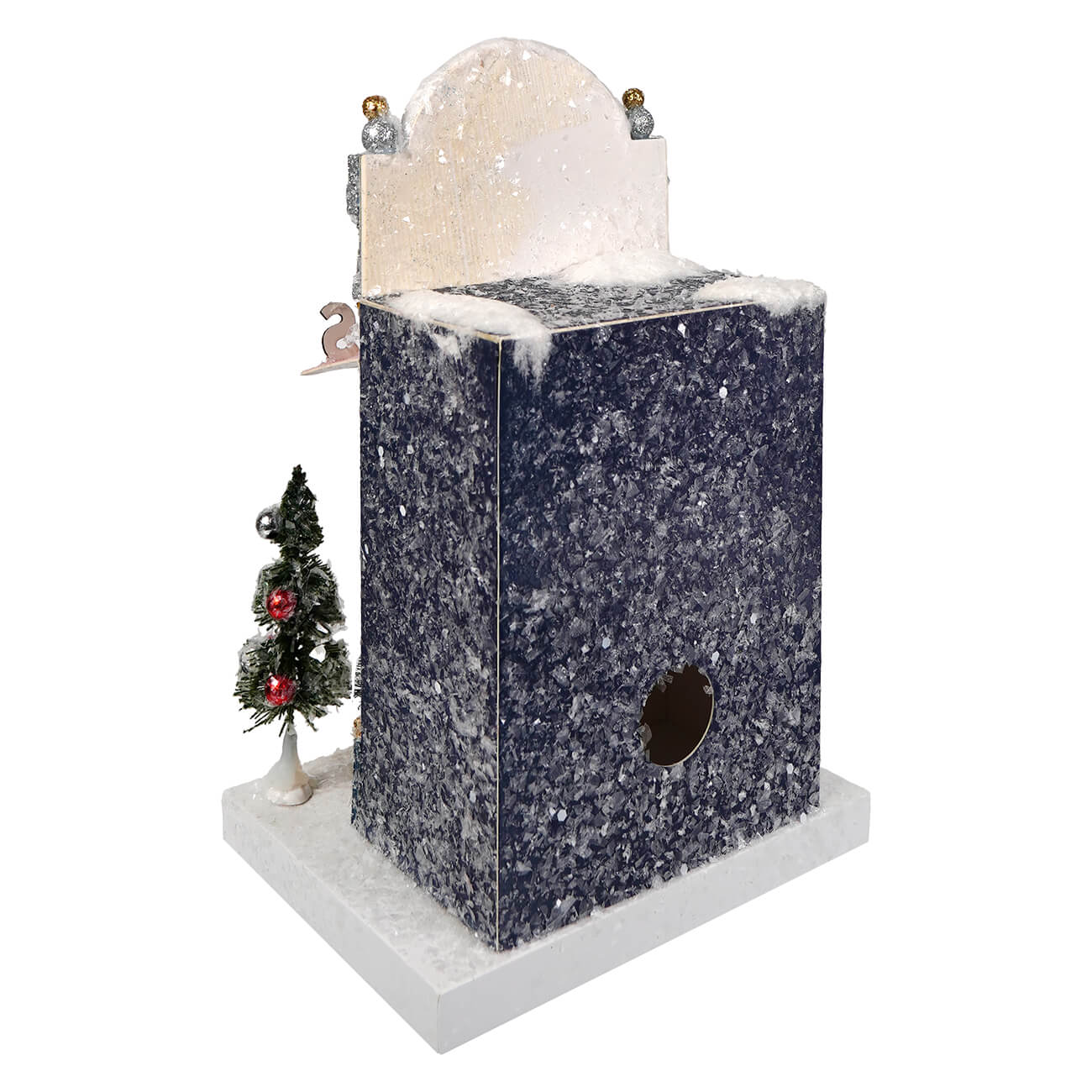 Miniature winter-themed christmas house by cody foster with speckled blue exterior in cocktail bar lounge style village house