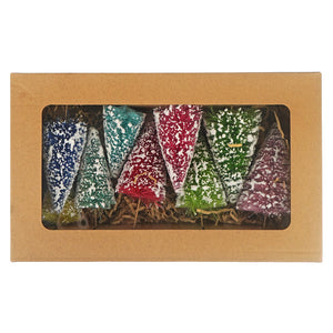 A set of six colorful frosted bottle brush christmas trees in blue green red and purple with snowflake patterns