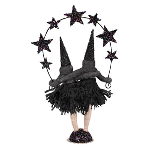 Conjoined sisters spun cotton witch craft figure in black glitter with pointed hat and fringed skirt on sparkly base
