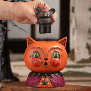 Orange cat-shaped decorative ceramic vase with green eyes and purple collar topped by black mouse figurine perfect for halloween cats decor