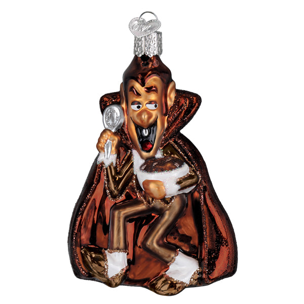 Glossy hand-blown glass count chocula ornament featuring a cartoon vampire in red cape with gold accents for world christmas