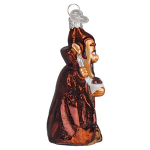 Glossy amber glass count chocula ornament with metallic robe accents and silver heart hanging loop for world christmas
