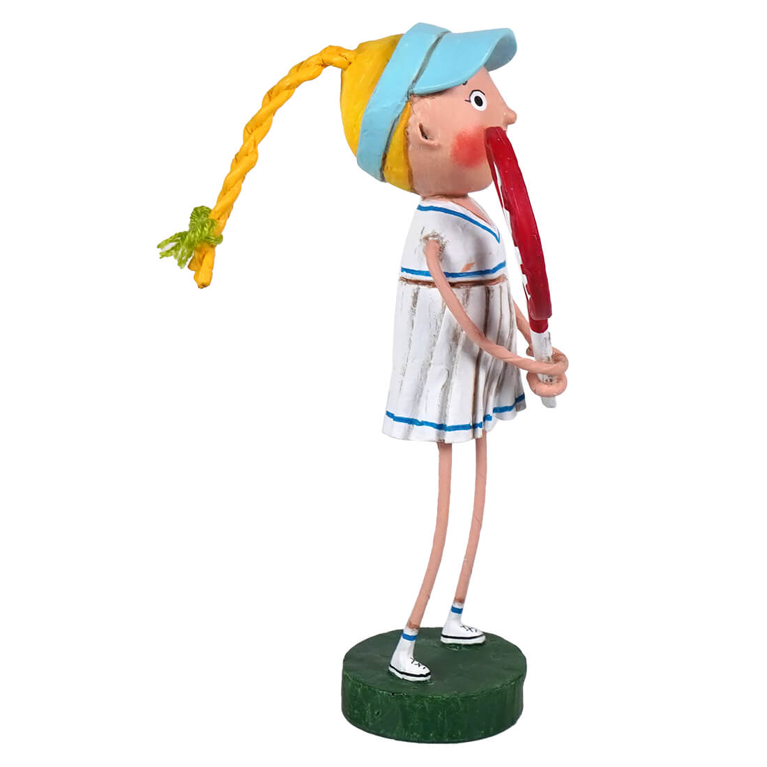 A whimsical lori mitchell patriotic figurine called courtney wearing a white tennis dress with blue trim holding a red racket