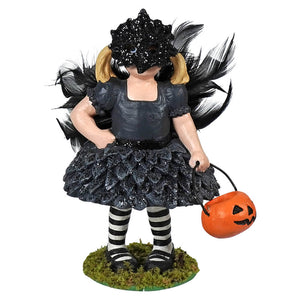 Black glittery witch figurine with blonde pigtails feathered wings and pumpkin bucket called crow hazel girl