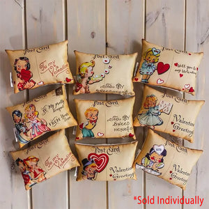 Vintage-style beige fabric cupid sweetheart pillow with retro cartoon illustrations and valentines day phrases