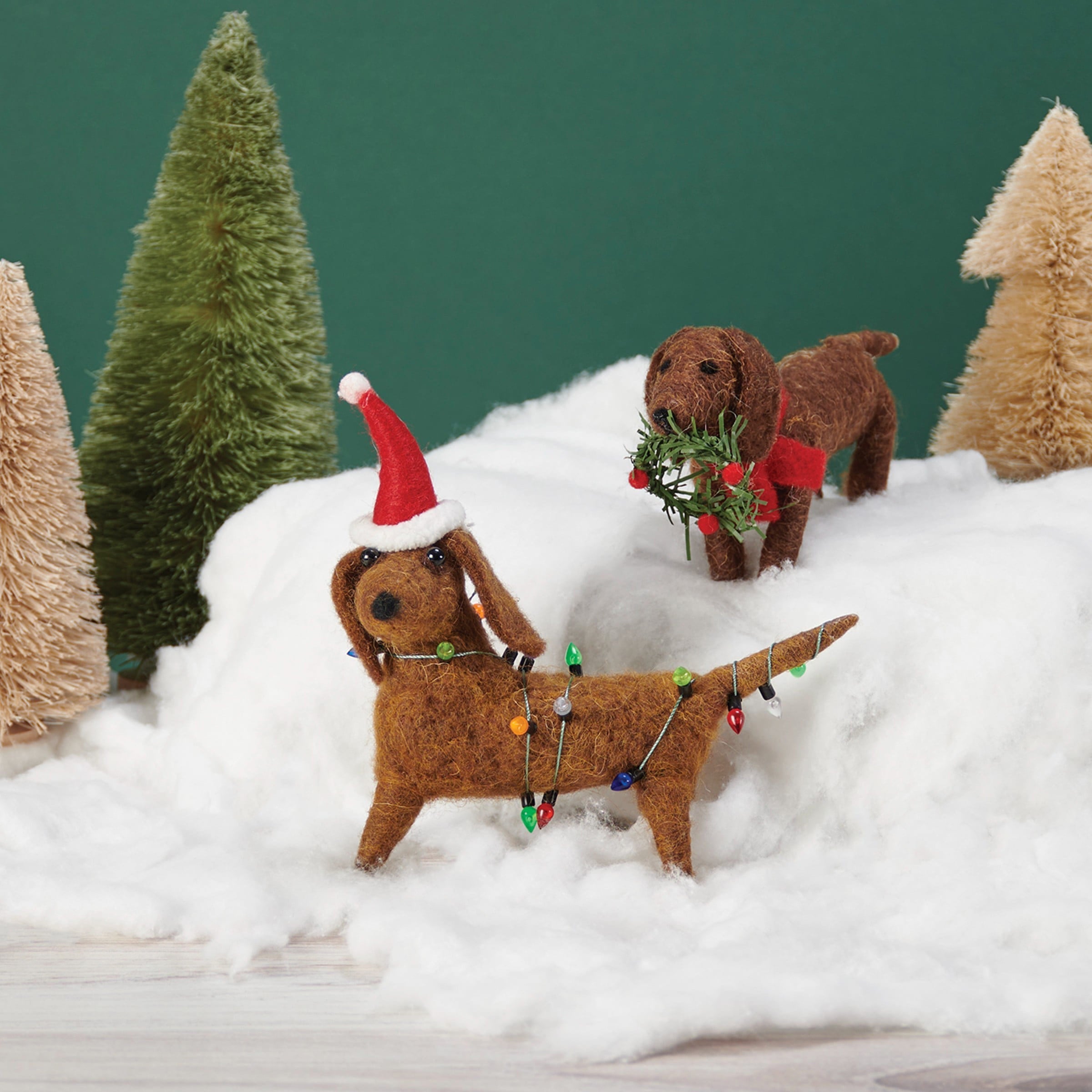 Brown felt dachshund mouse critter ornament with festive christmas lights and red santa hat lighted decor
