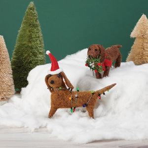 Brown felt dachshund mouse critter ornament with festive christmas lights and red santa hat lighted decor
