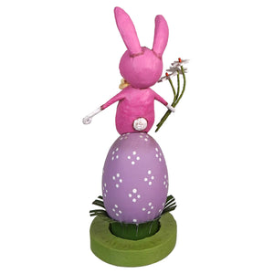 Pink lori mitchell bunny figurine holding daisies atop a purple polka-dotted egg spring decor daisy may ornament