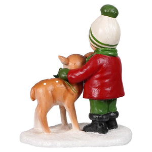 A charming bethany lowe designs miniature figurine of danny in a red coat hugging a spotted deer on a snowy base