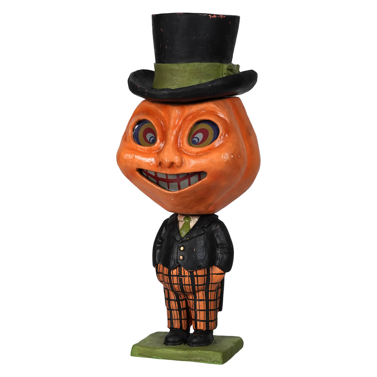 Dashing peter pumpkinhead figurine with an orange pumpkin head dressed in a black suit and halloween pumpkins theme