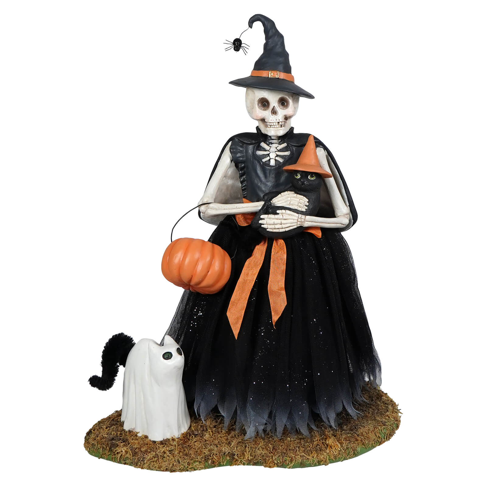 Deadra skeleton figurine dressed in black gown with orange ribbon holding pumpkin basket and black cat with witch hat