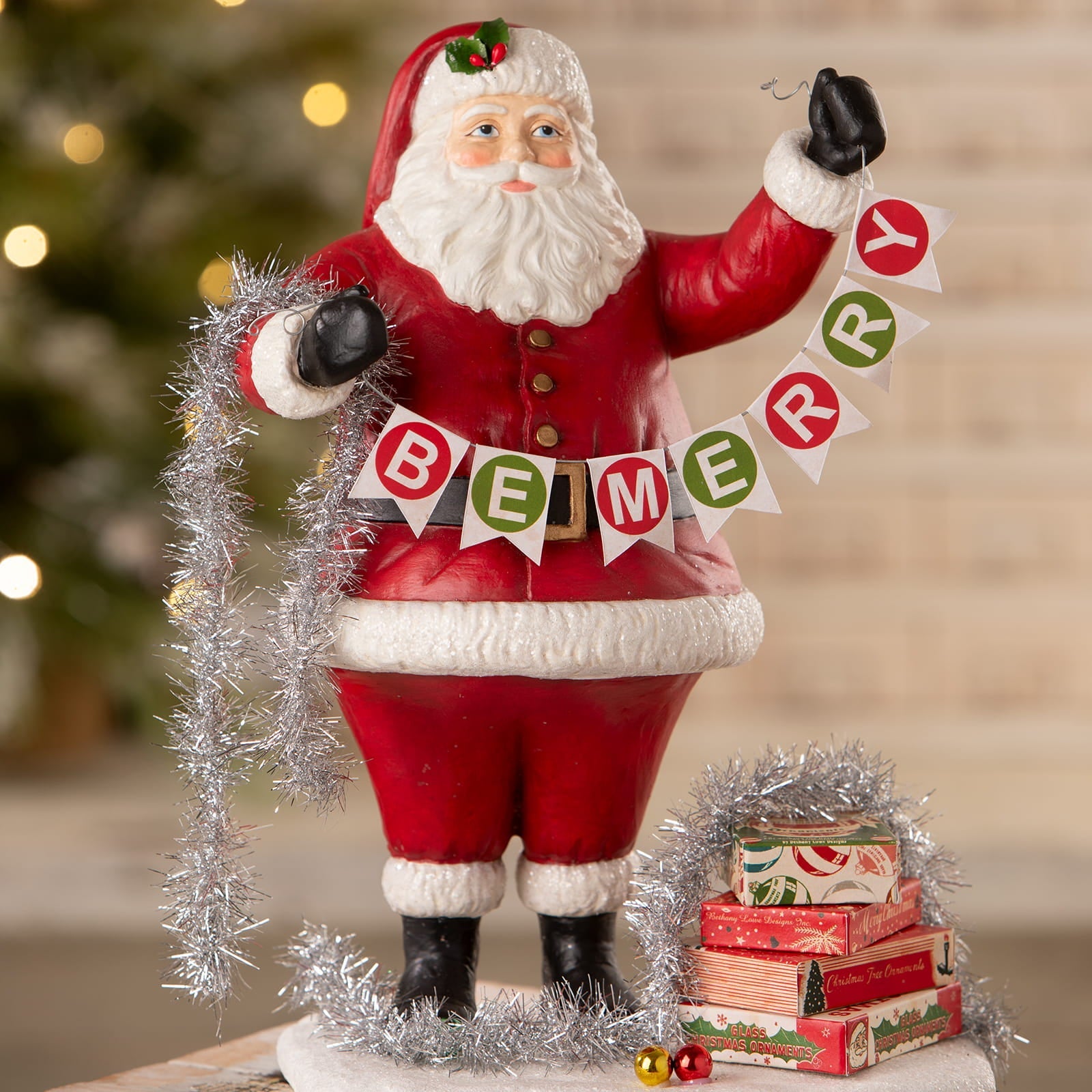 Deck the halls santa by bethany lowe designs red and white santa figure holding bemerry banner with silver tinsel