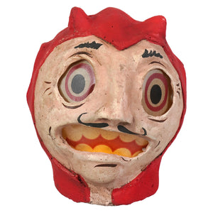 Red and beige ceramic devil lantern with black painted eyebrows mustache and concentric circle eyes by rachel garrison figural decor
