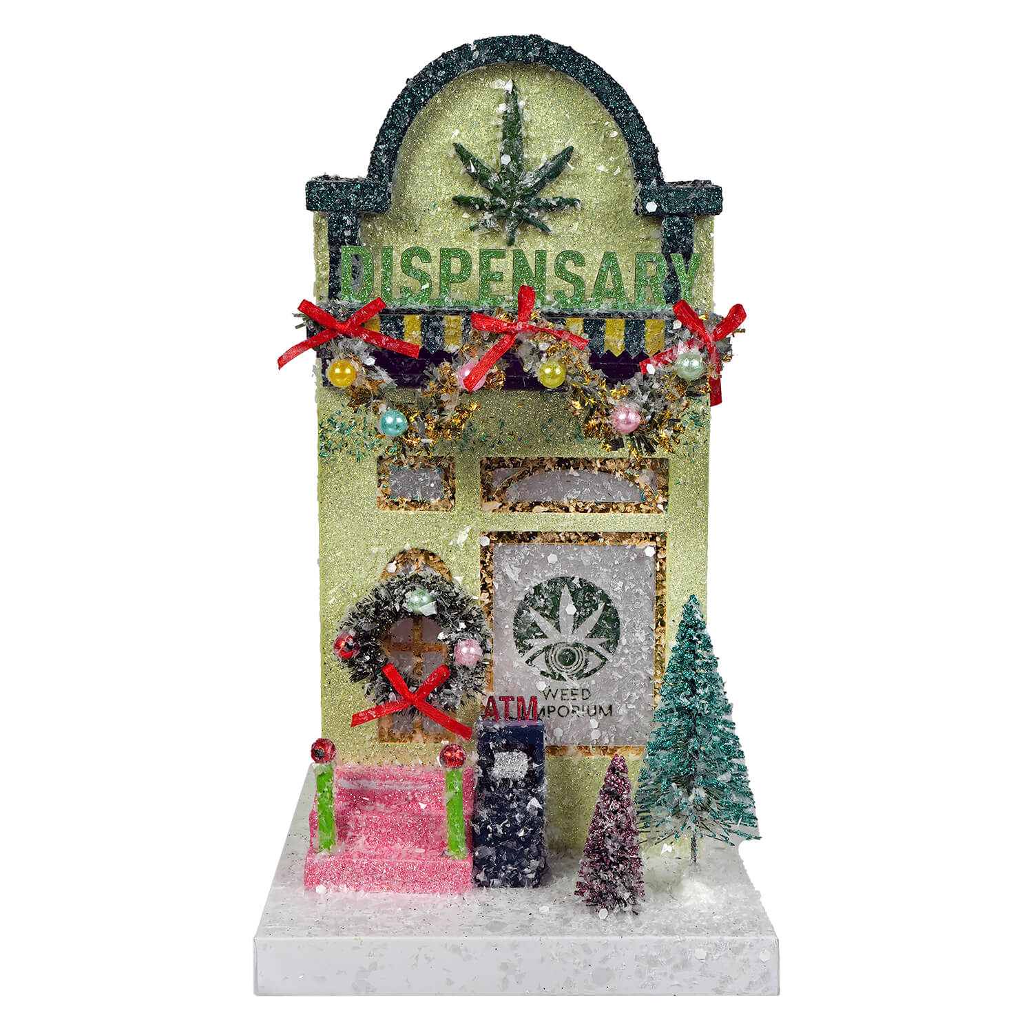 Glittery gold cody foster dispensary village house with cannabis leaf emblem, festive garlands, and miniature trees